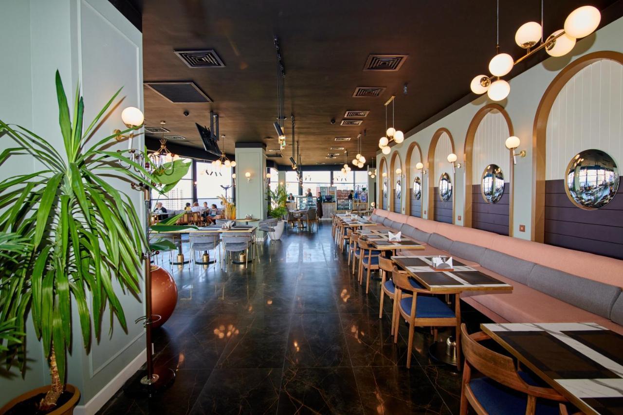 Grand Hotel Victory Актау Екстер'єр фото Restaurant interior