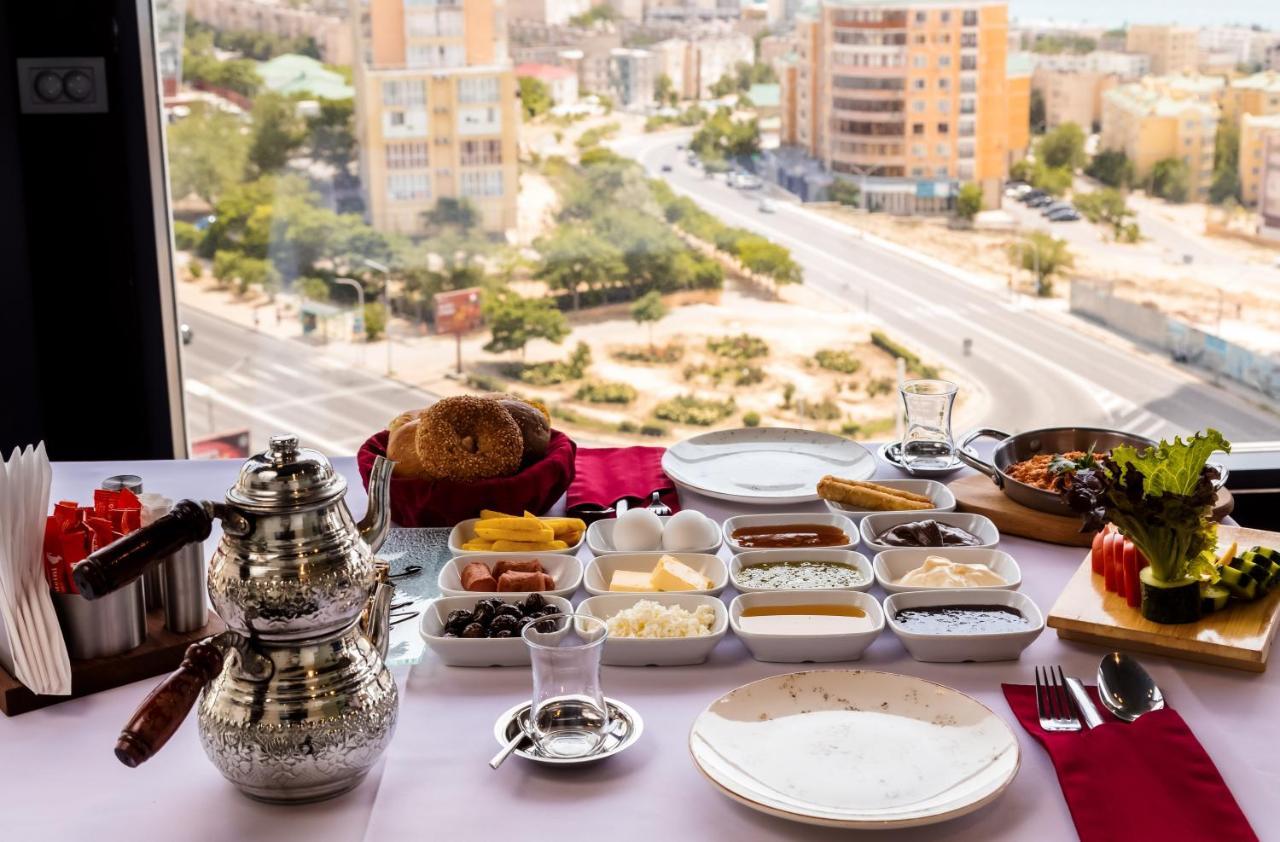 Grand Hotel Victory Актау Екстер'єр фото Israeli breakfast