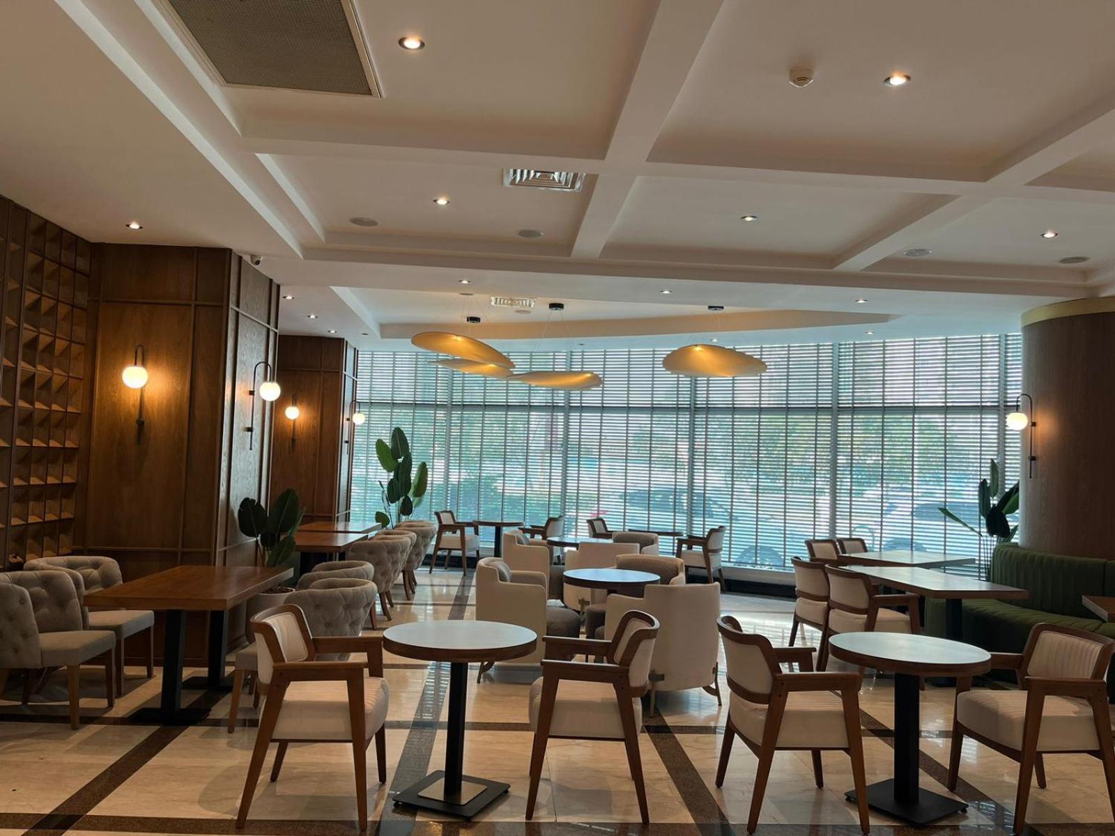 Grand Hotel Victory Актау Екстер'єр фото The interior of the lounge