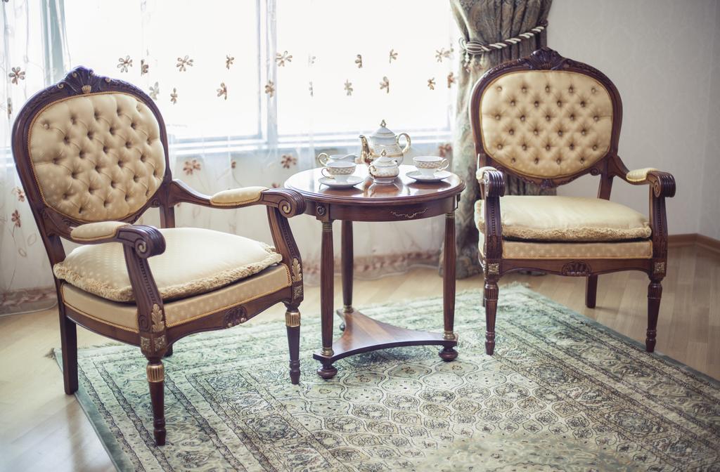 Grand Hotel Victory Актау Екстер'єр фото A carpet in a living room